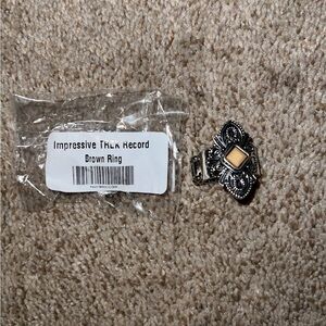 Impressive TREK Record Brown Ring